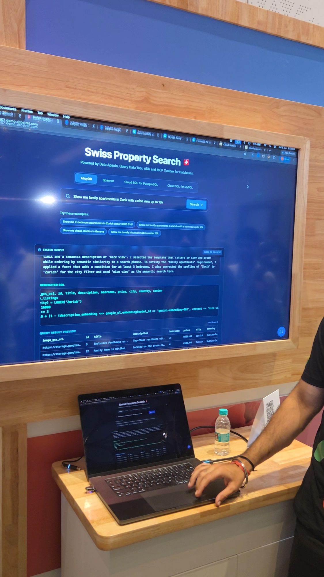 Swiss Property Search demo screen at Google Cloud Summit, showing a natural-language query — 'Show me family apartments in Zurich with a nice view up to 16k' — converted into generated SQL for AlloyDB using embeddings and semantic similarity, with the agent's reasoning visible on screen.